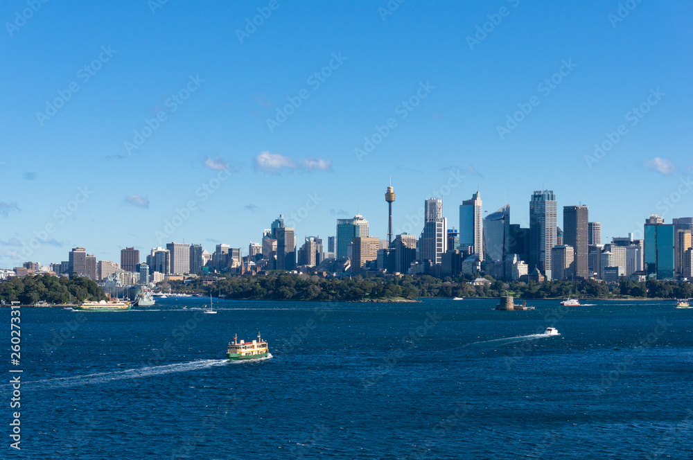 Epic view on Sydney cityscape with ferry boat