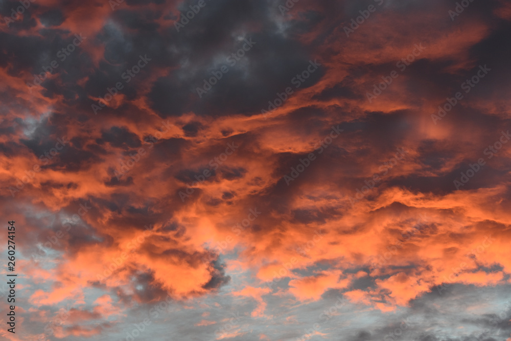 Dramatic Oklahoma Sky with Orange Reflections of the Sun Overlay	