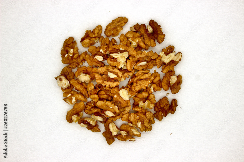 Walnut Kernels (Other Names: Juglans Regia, Persian Walnut, English Walnut, Circassian Walnut). Isolated Image On A White Background Walnut Kernels (Other Names: Juglans Regia, Persian Walnut, English Walnut, Circassian Walnut). Isolated Image On A White Background