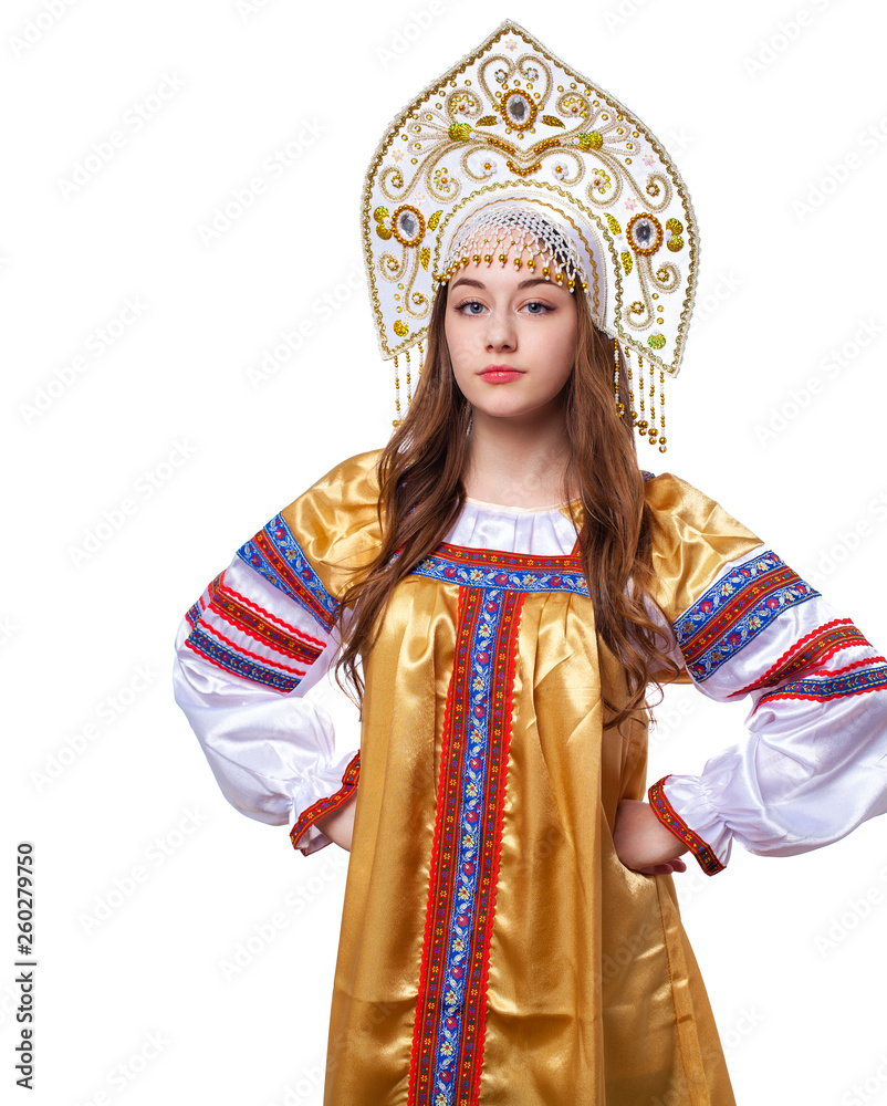 Fototapeta premium Traditional Russian folk costume, portrait of a young beautiful girl