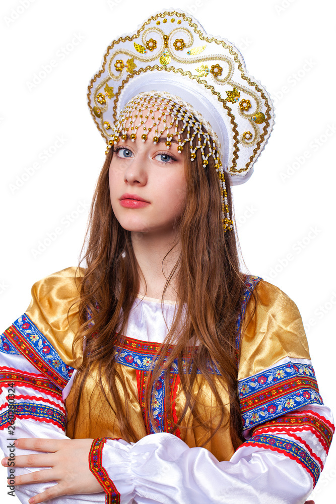 Traditional Russian folk costume, portrait of a young beautiful girl