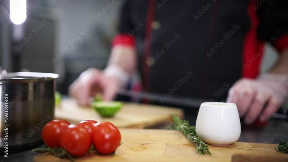 Chef preparing his workplace for cooking. Chef preparing his workplace for cooking.