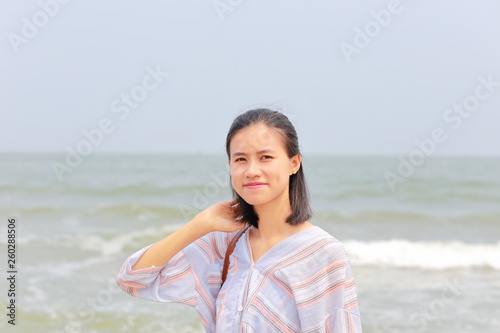 young woman at Samson beach in Vietnam
