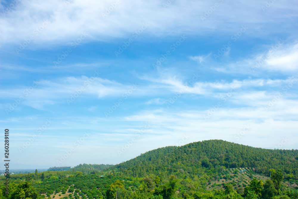 Landscape of sky and green mountain in summer season at north Thailand.