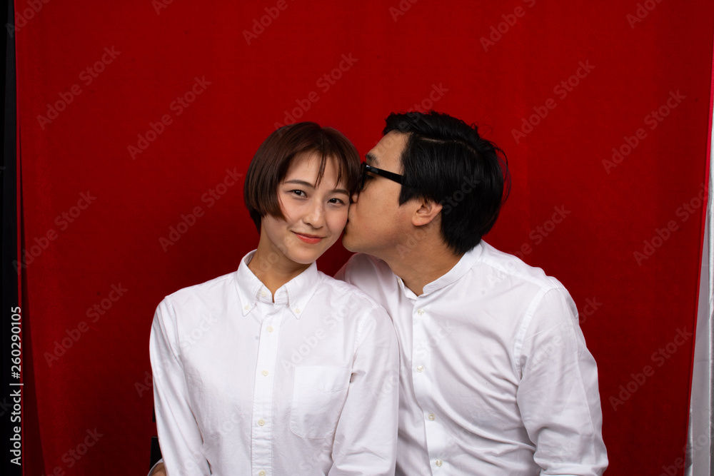 Chinese couple taking a photo for their marriage certificate Chinese couple taking a photo for their marriage certificate