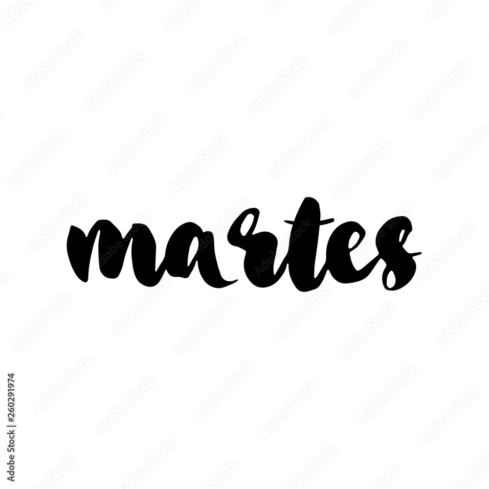 Man Hand writing Martes (Tuesday in Spanish) with black marker on