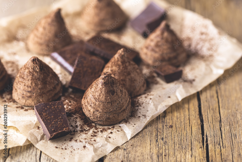 Homemade Tasty Chocolate Truffle Candy on the Old Wooden Background Tasty Dessert Horizontal Toned Homemade Tasty Chocolate Truffle Candy on the Old Wooden Background Tasty Dessert Horizontal Toned
