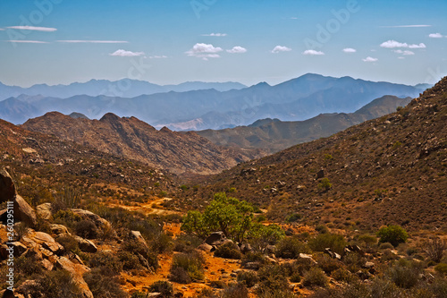 Rugged Valley with distant hills photo