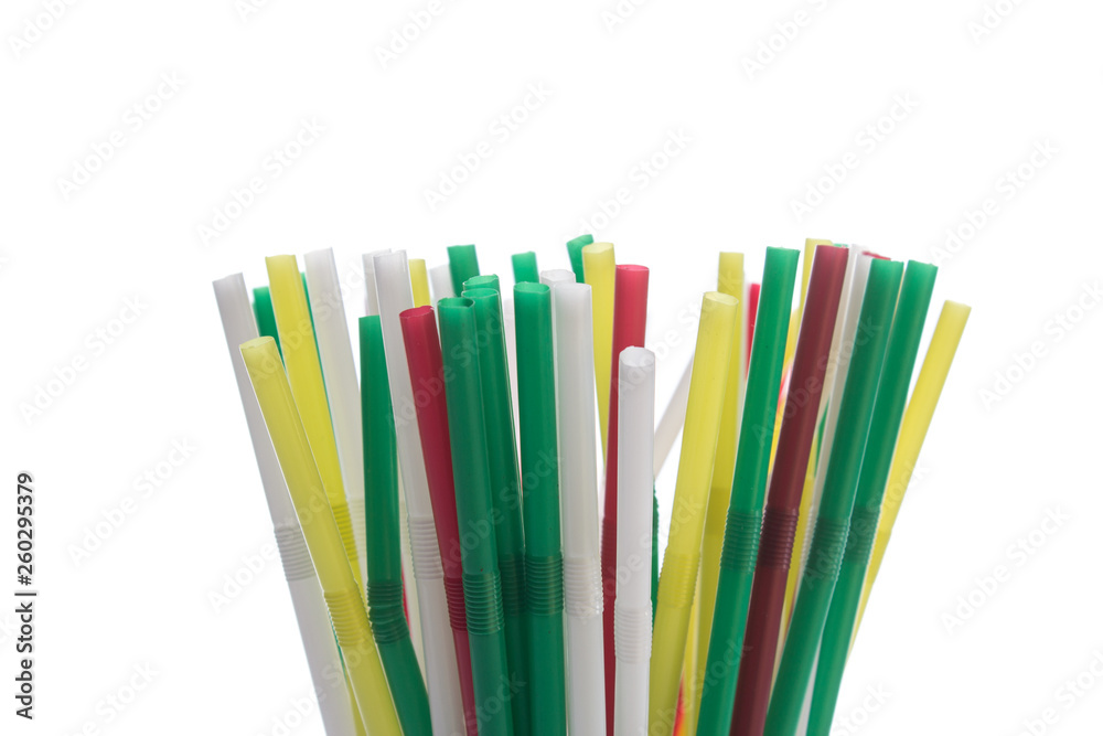 Colorful plastic straws isolated on the white background. Set for a birthday. Colorful plastic straws isolated on the white background. Set for a birthday.