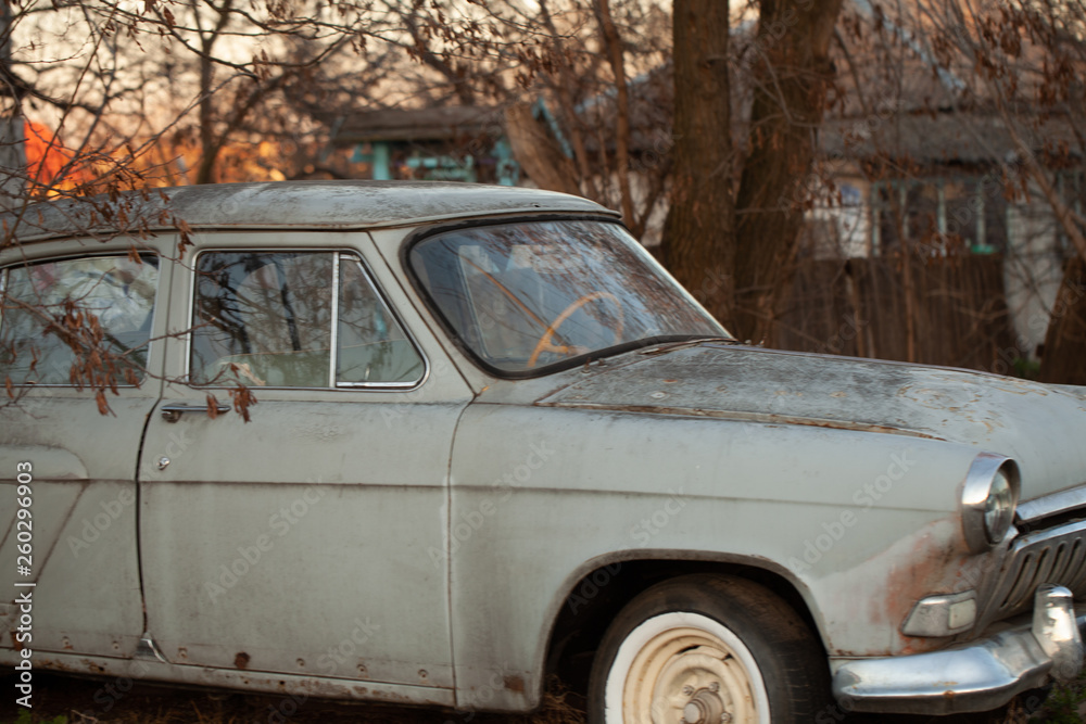 Photo of one old car in the village Photo of one old car in the village