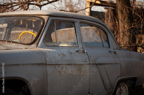Photo of one old car in the village © sergeytay