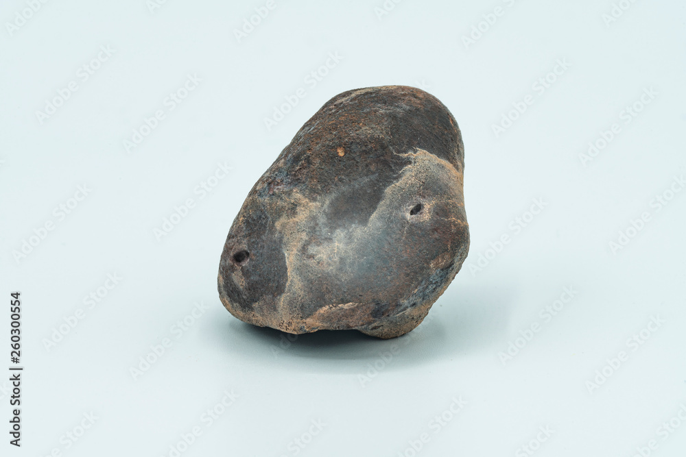 Chondrite Meteorite isolated, a piece of rock formed in outer space in the early stages of Solar System as asteroids. This meteorite comes from a meteorite fall impacting the Earth at Atacama Desert Chondrite Meteorite isolated, a piece of rock formed in outer space in the early stages of Solar System as asteroids. This meteorite comes from a meteorite fall impacting the Earth at Atacama Desert