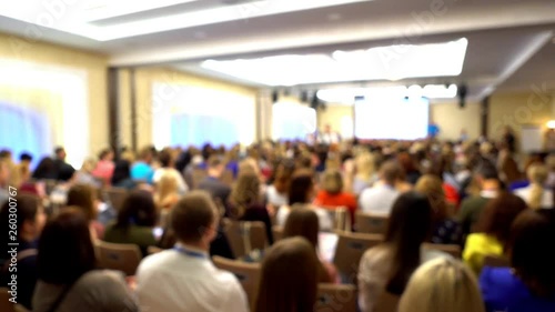Wallpaper Mural he woman with the smartphone in hands. People at a conference. Beautiful view. Torontodigital.ca