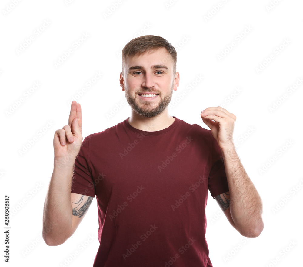Fototapeta premium Man using sign language on white background