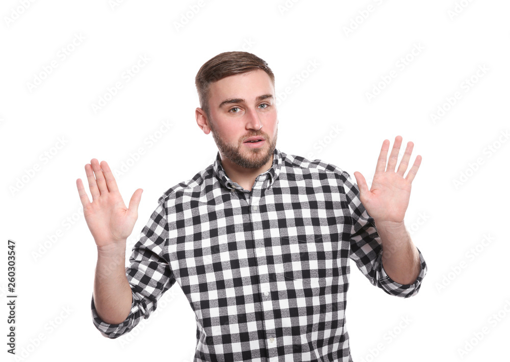 Man showing STOP gesture using sign language on white background Man showing STOP gesture using sign language on white background