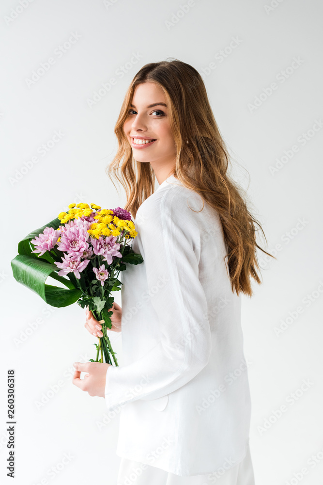 cheerful girl holding bouquet of wildflowers and smiling on white cheerful girl holding bouquet of wildflowers and smiling on white