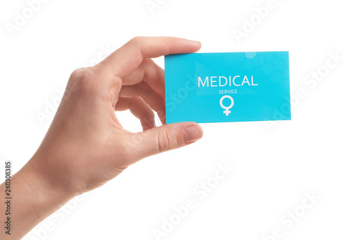 Girl holding medical business card isolated on white, closeup. Women's health service