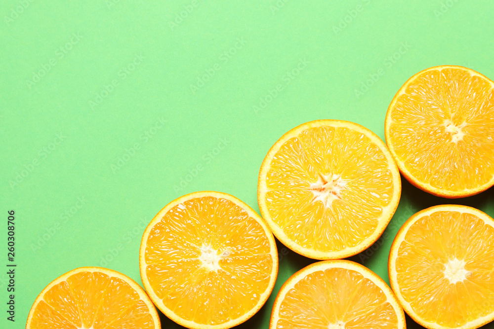 Flat lay composition with ripe oranges and space for text on color background Flat lay composition with ripe oranges and space for text on color background