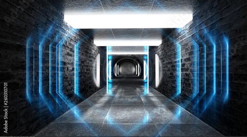 Fototapeta Naklejka Na Ścianę i Meble -  Tunnel in blue neon light, underground passage. Abstract blue background. Background of an empty black corridor with neon light. Abstract background with lines and glow