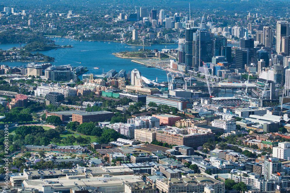 SYDNEY - OCTOBER 2015: Aerial view of city buildings on a beautiful sunny day. The city attracts 20 million people annually