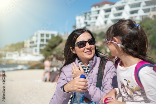 Photography Woman and daughter enjoy beautiful Bondi Beach, Australia