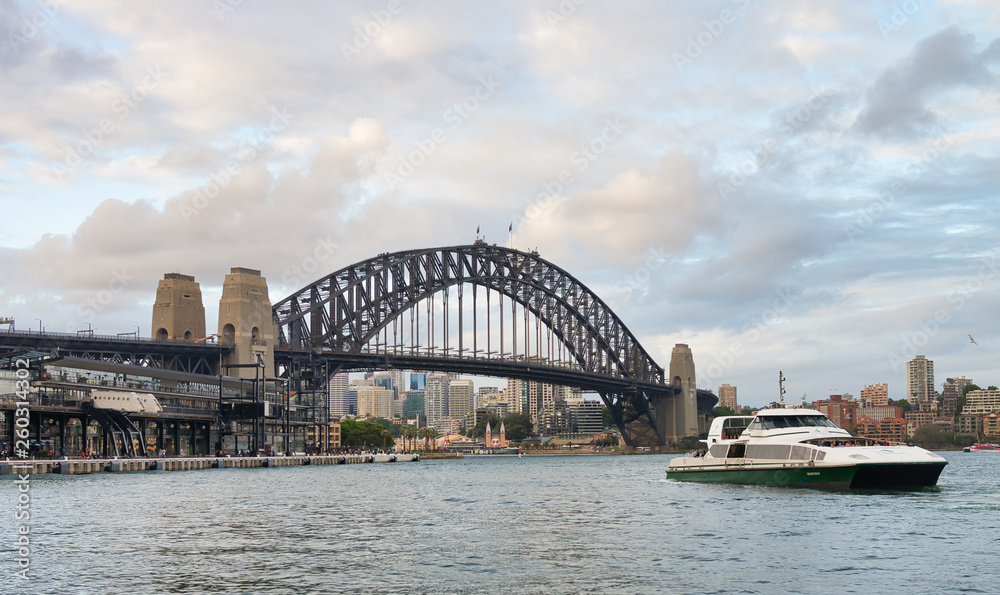SYDNEY - NOVEMBER 6, 2015: Beautiful view of Sydney Harbor  on a cloudy day. Sydney attracts 20 million tourists every year