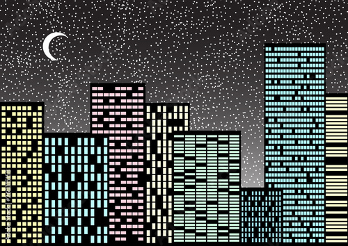 Tall glass skyscraper on background of the night sky