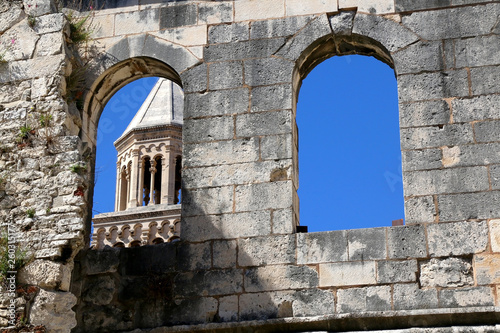 View of historical Saint Domnius bell tower and ancient Silver Gate, landmarks in Split, Croatia. 