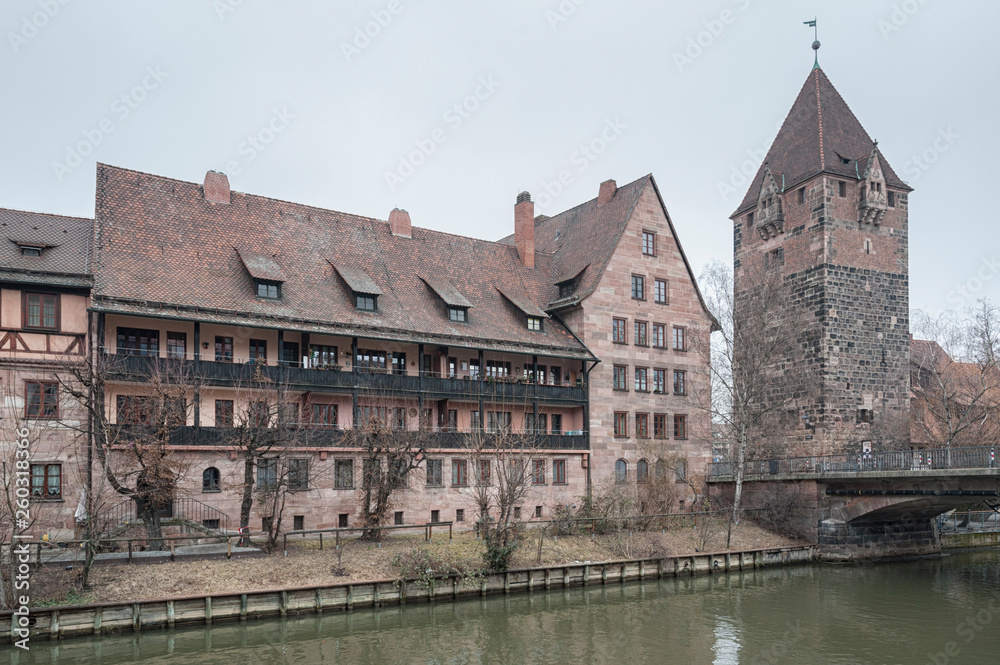 Heilig-Geist-Spital (Hospice of the Holy Spirit) in Old Town Nuremberg. View from the Museum Bridge on the on the River Pegnitz - Nuremberg, Bavaria - Germany