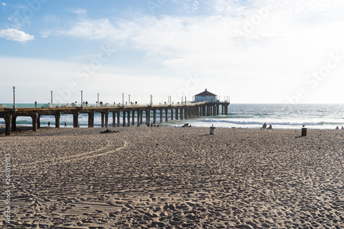 View of the Manhattan Beach pier and beach  during the late afternoon sunshine in Southern California