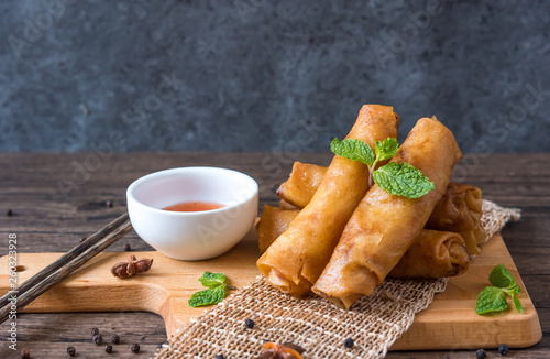 deep fried spring rolls, Por Pieer Tod or Fried spring rolls (Thai Spring Roll) Snacks and snacks that are popular with Thai and Chinese people. photo