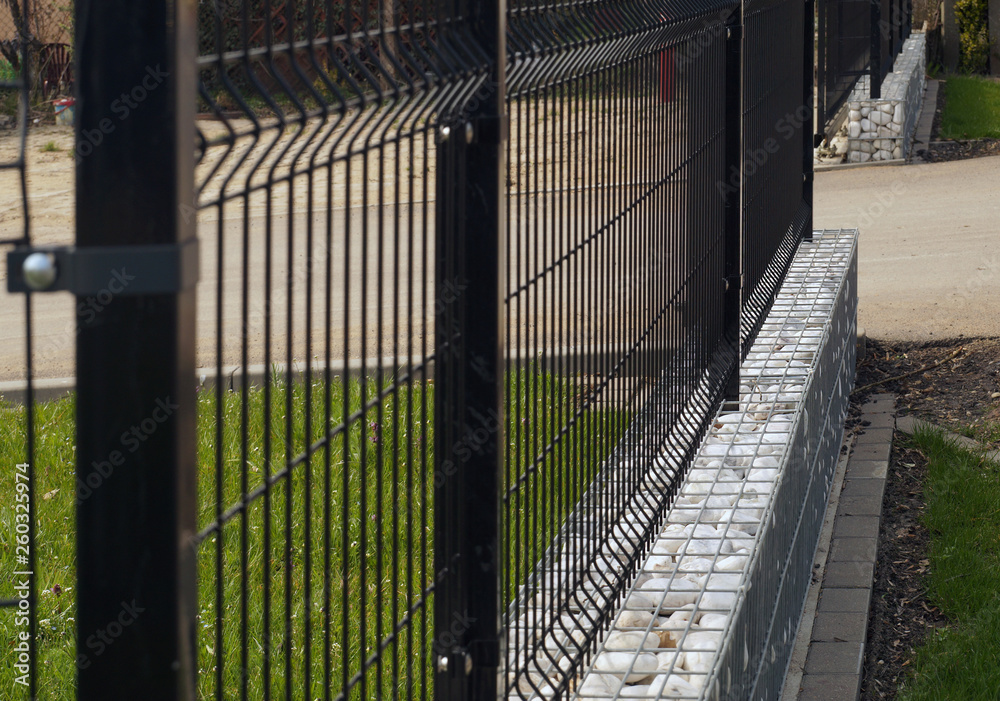 Close-up on a steel, galvanized structure filled with spectacular pieces of rock.. Gabion. Close-up on a steel, galvanized structure filled with spectacular pieces of rock.. Gabion.