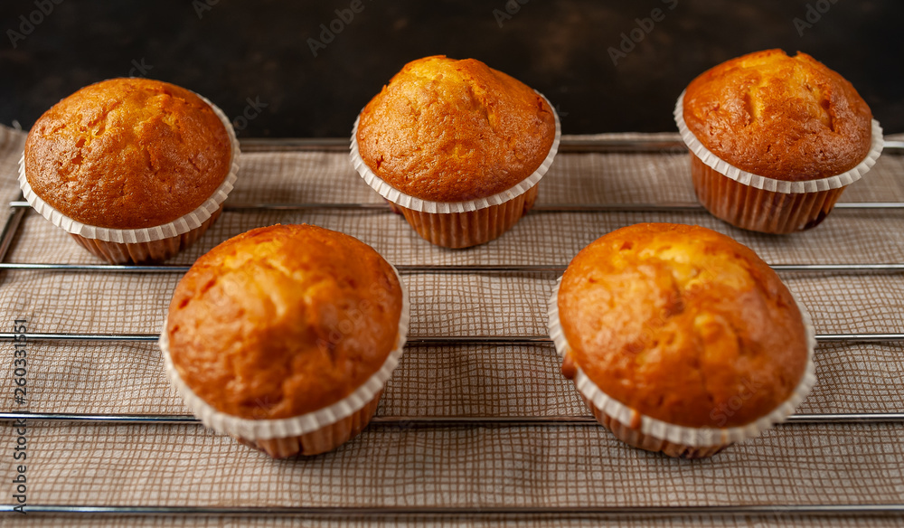 muffins with filling, on a background of dark concrete muffins with filling, on a background of dark concrete