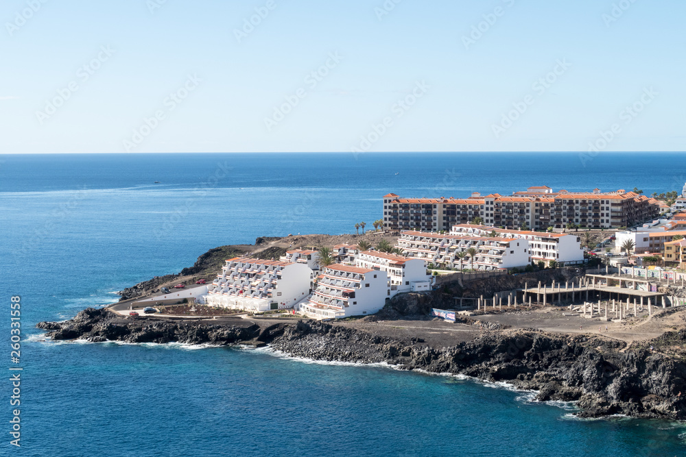 Beautiful seascape landscape and holiday apartments along the coast of El Medano, Costa del Silencio, Tenerife, Spain.