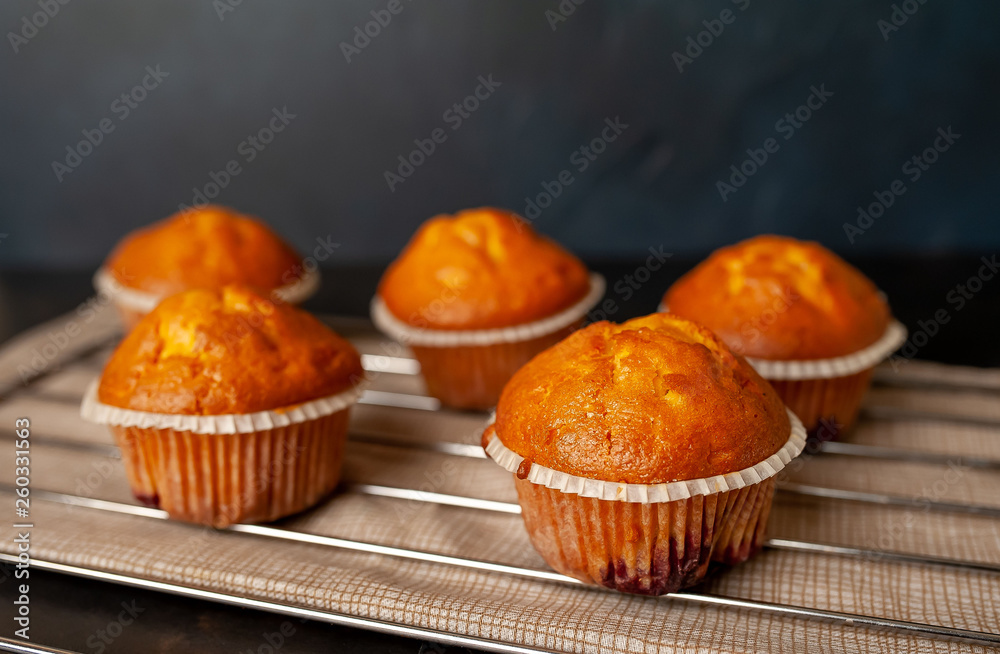 muffins with filling, on a background of dark concrete muffins with filling, on a background of dark concrete