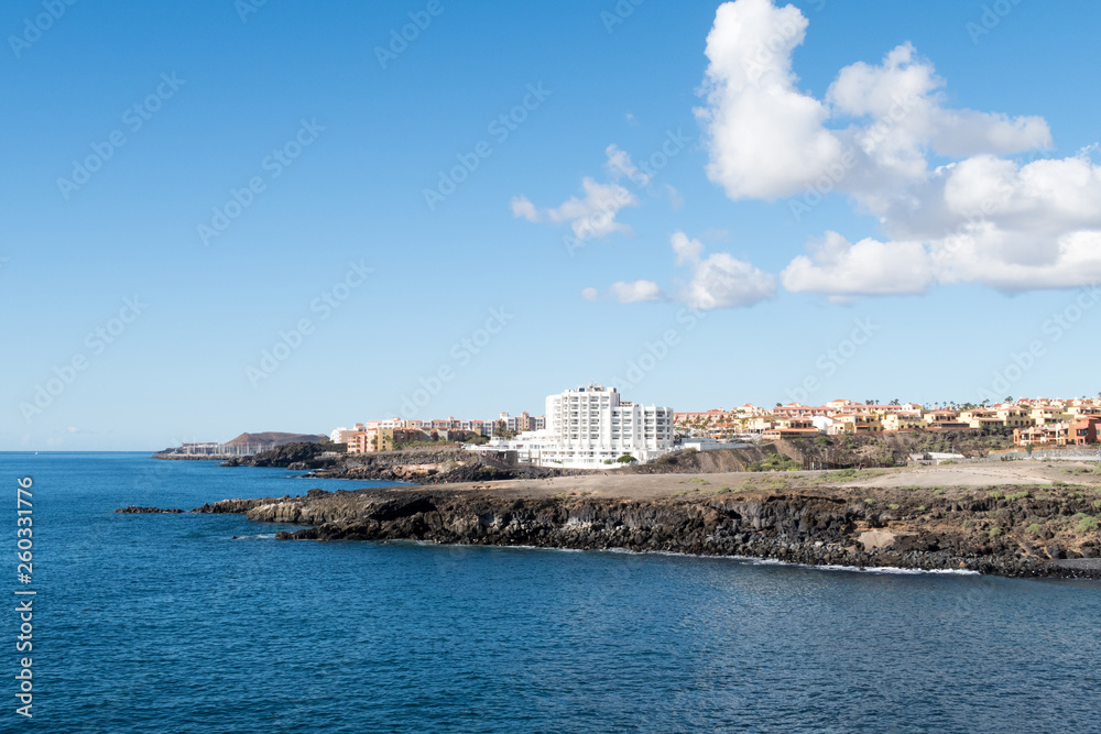 Beautiful seascape landscape and holiday apartments along the coast of El Medano, Costa del Silencio, Tenerife, Spain.