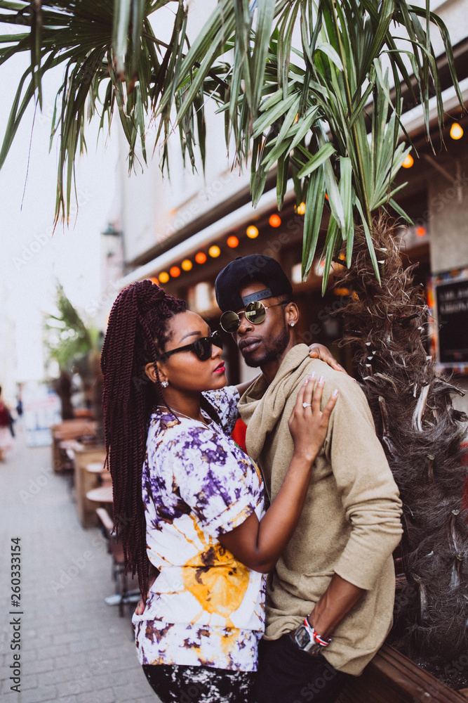 The love story of a guy and a girl on the city streets. Young people travel. Spring walk around the city.