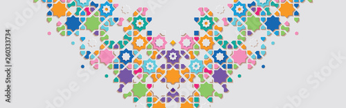 Ornamental colorful patterned stone relief in arabic architectural style of islamic mosque.Greeting card for Ramadan Kareem.
