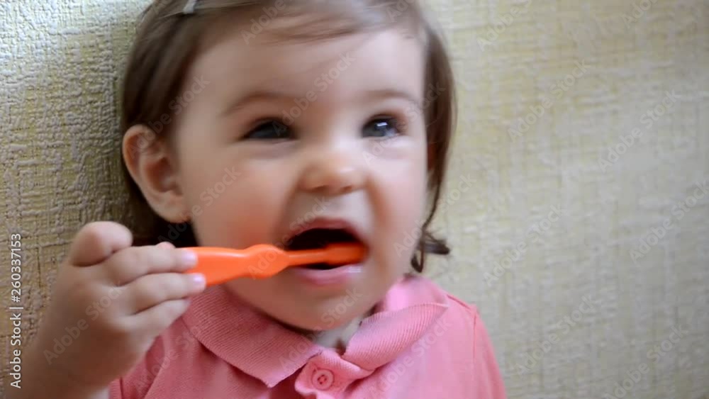 dental hygiene. happy little girl toddlers brushing her teeth. Healthy concept dental hygiene. happy little girl toddlers brushing her teeth. Healthy concept