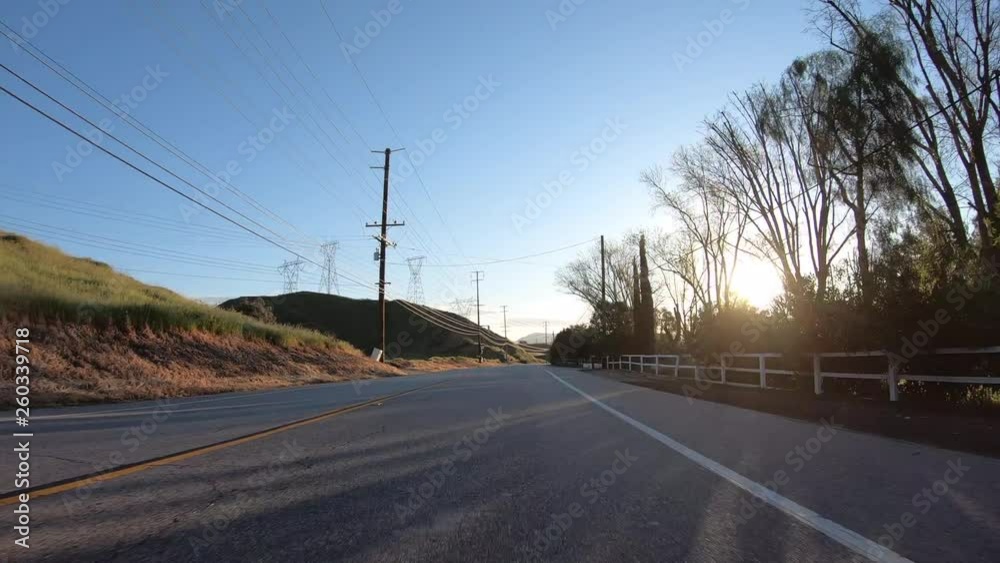 Countryside sunrise driving shot on Bouquet Canyon Road between Santa Clarita and Lancaster, California. Countryside sunrise driving shot on Bouquet Canyon Road between Santa Clarita and Lancaster, California.
