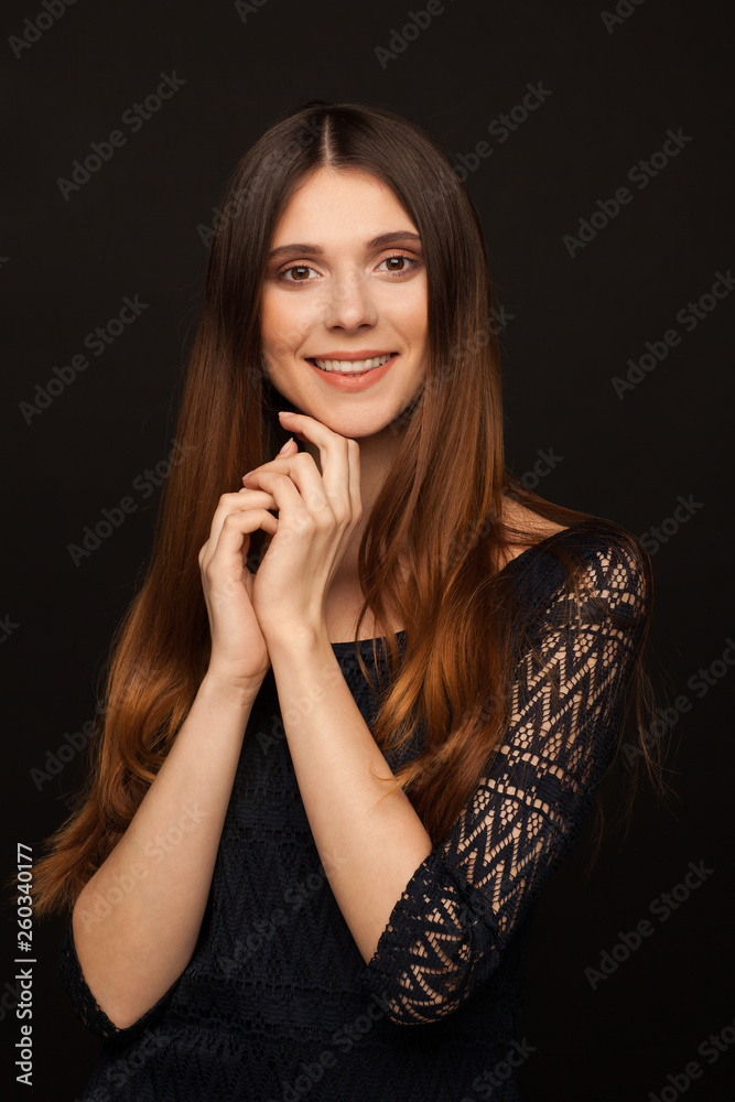 Portrait of a beautiful woman with straight long hair and interesting emotion. Studio photo session Portrait of a beautiful woman with straight long hair and interesting emotion. Studio photo session