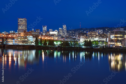 Night panorama of Portland, Oregon. Reflections of city lights in Willamette river