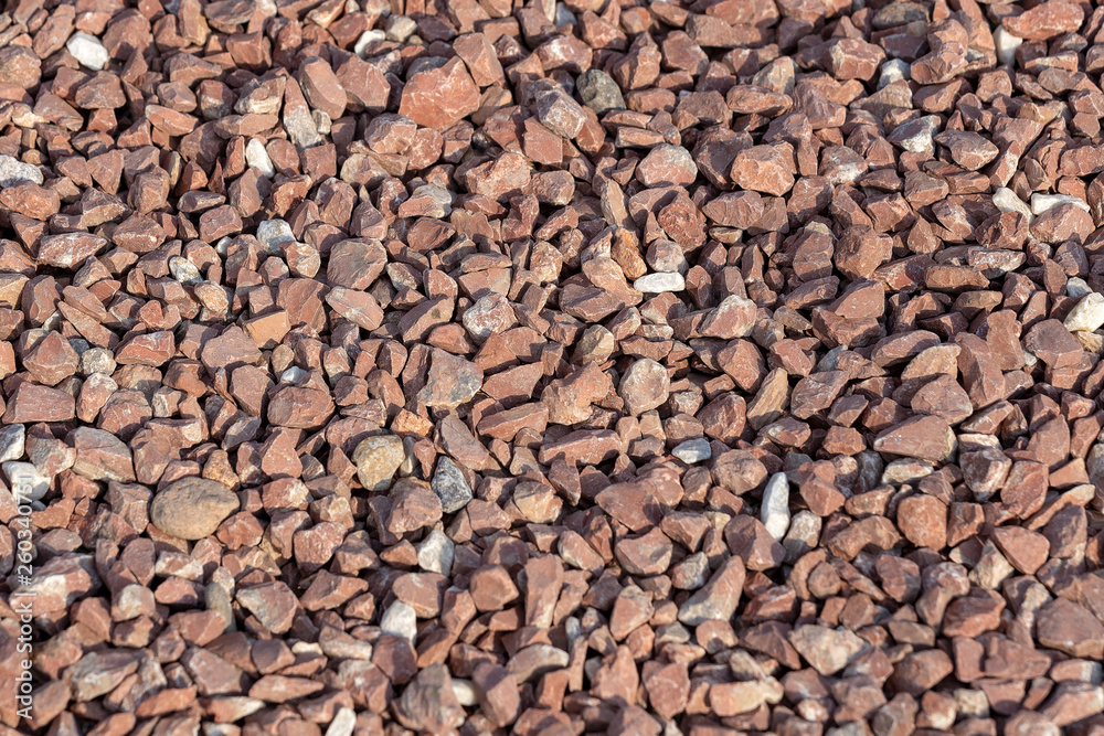 Red Brown Gravel or Soil Texture Background for Design. Real gravel texture background and small stone on ground Red Brown Gravel or Soil Texture Background for Design. Real gravel texture background and small stone on ground