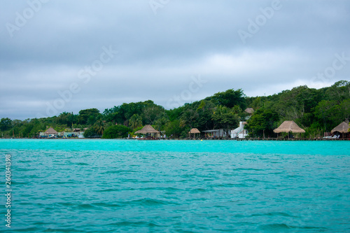 Fototapeta Naklejka Na Ścianę i Meble -  Bacalar Lake Lagoon in Mexico. Crystal Clear Blue and Green Water. 