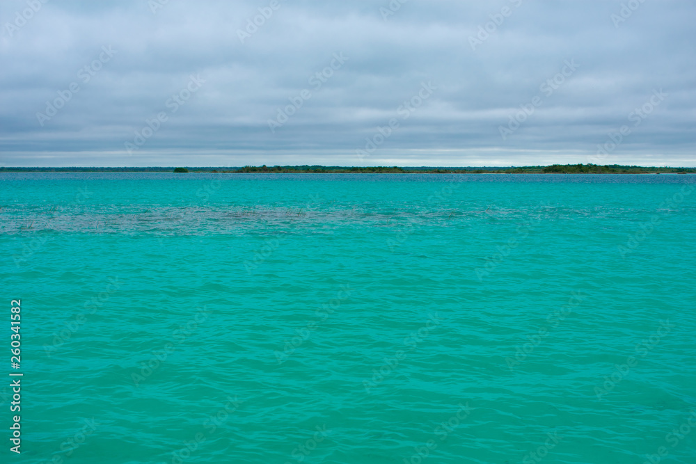 Bacalar Lake Lagoon in Mexico. Crystal Clear Blue and Green Water. 