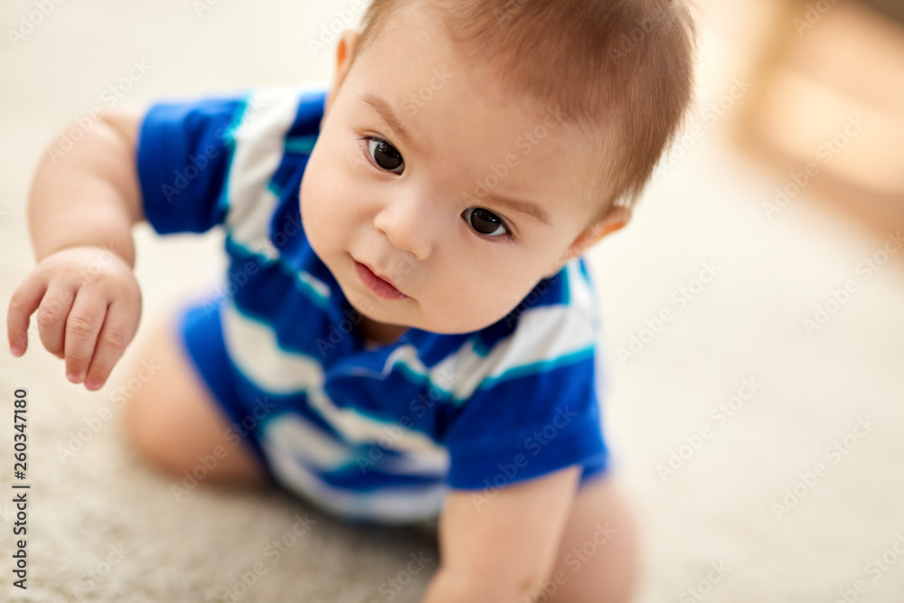 babyhood, childhood and people concept - close up of sweet little asian baby boy babyhood, childhood and people concept - close up of sweet little asian baby boy