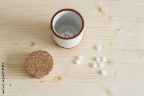 Pills in Ceramic Container photo