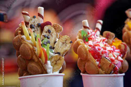 Fresh sweet bakery with candies and ice cream, street food