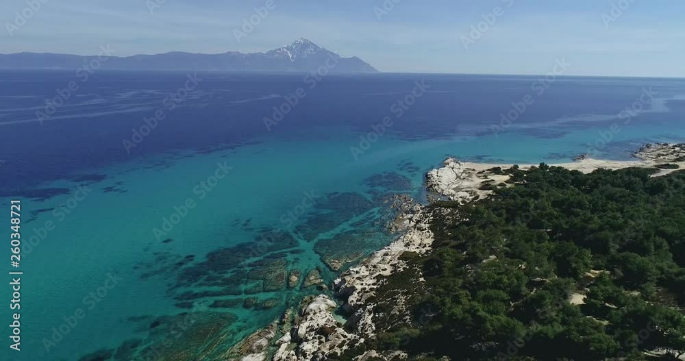 Aerial flight with drone over the Kavourotrypes or Orange is a small paradise of small beaches located between Armenistis and Platanitsi in Sithonia, Chalkidiki, Greece Aerial flight with drone over the Kavourotrypes or Orange is a small paradise of small beaches located between Armenistis and Platanitsi in Sithonia, Chalkidiki, Greece