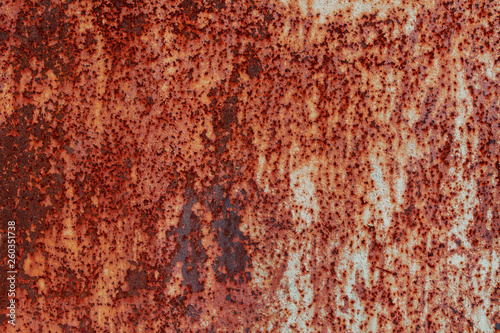 Rusty metal texture. Corroded grey iron background. Steel surface rusted spots. Vintage industrial backdrop.
